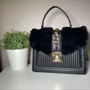 ALDO faux fur handbag with strap.